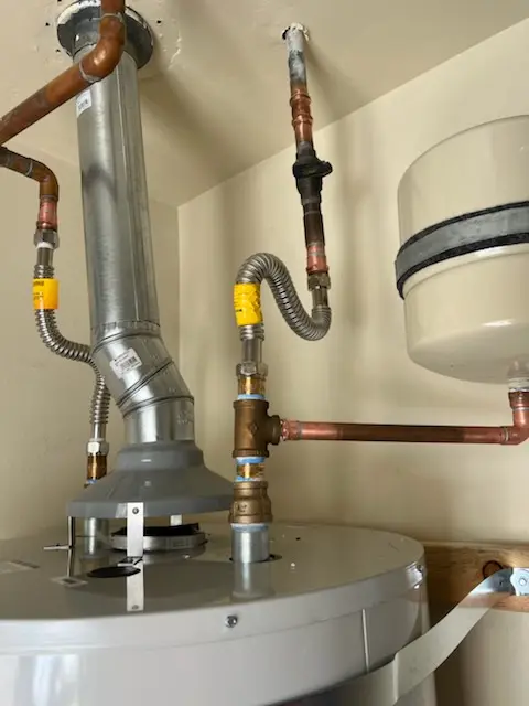 Water heater installation and plumbing repair in Stadium Area